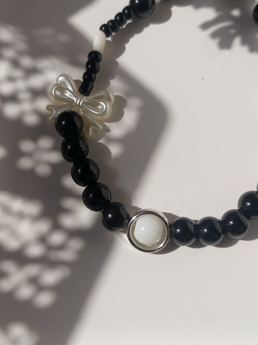 Balck beauty bow charm phone lanyard